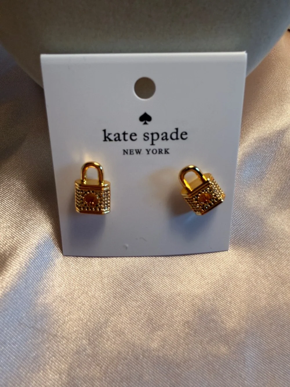Kate Spade gold lock earrings